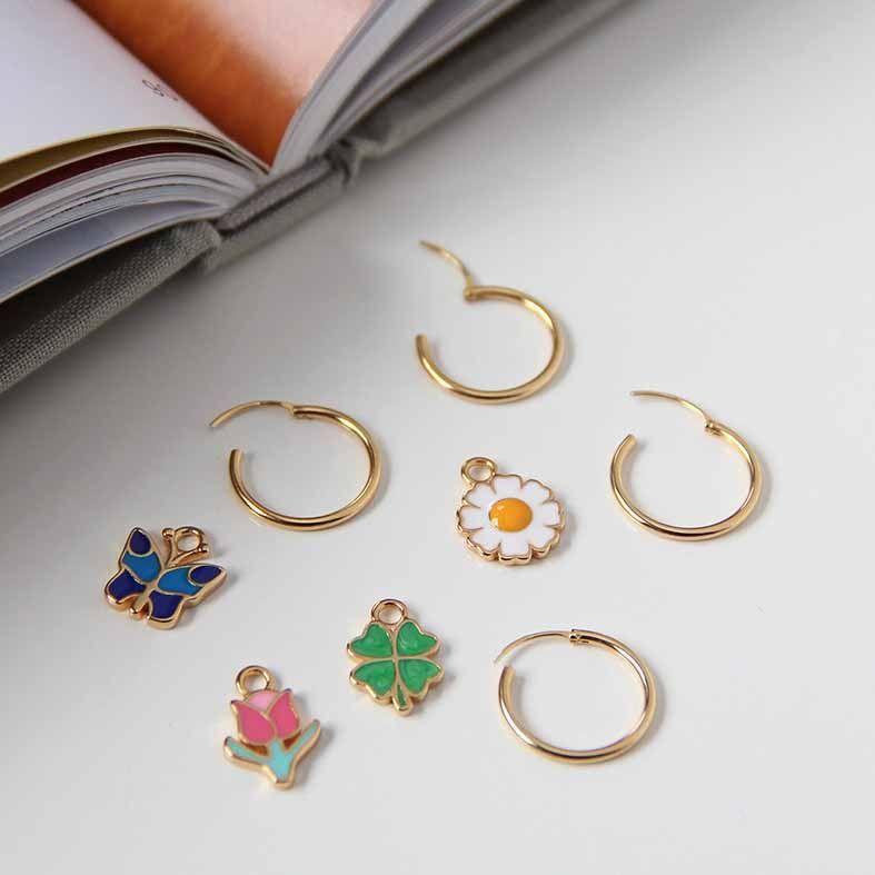 beautiful four leaf clover flower flower butterfly 925 sterling silver hoop earrings